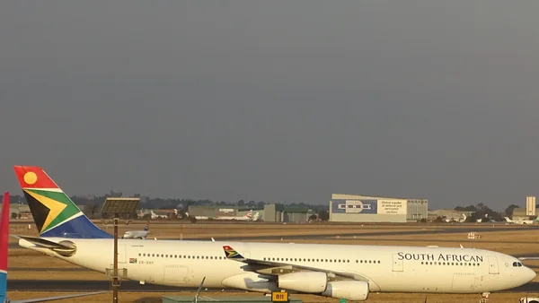 South African Airways Airbus A340 on the apron at O.R. Tambo International Airport in Johannesburg.