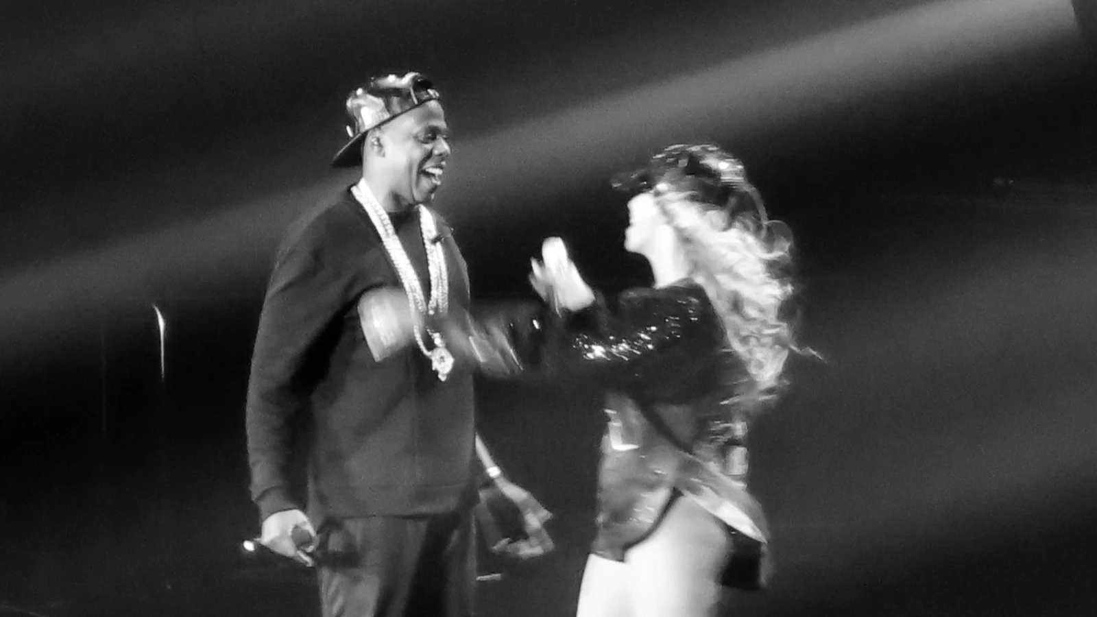 Beyoncé and Jay-Z embracing, following their performance of "Diva/Bow Down/Tom Ford" on The Mrs. Carter Show World Tour (August, 2013)