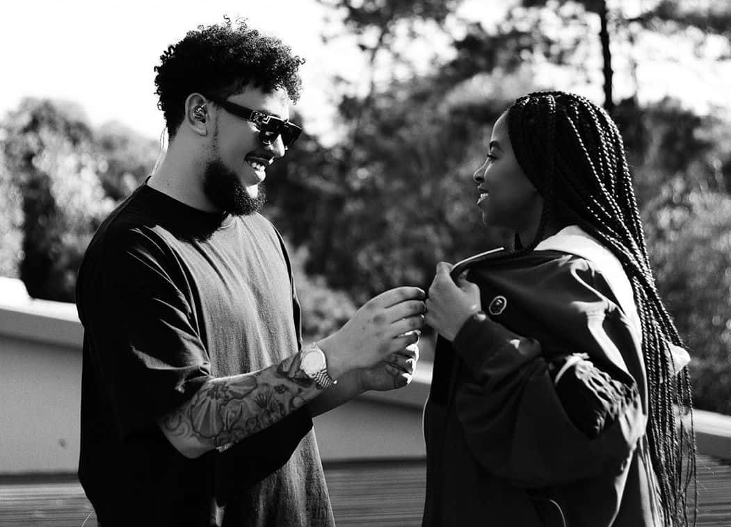 Watch AKA & Girlfriend Nelli Answer “Who Is” Questions About Their Relationship