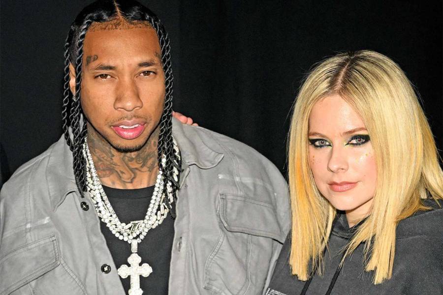 The Moment Tyga & Avril Lavigne Shared A Kiss  At The  Paris Fashion Week.